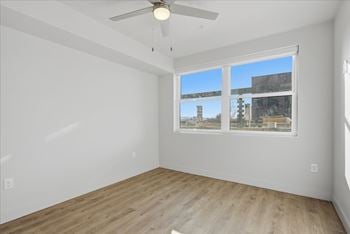 Empty room with window and ceiling fan1